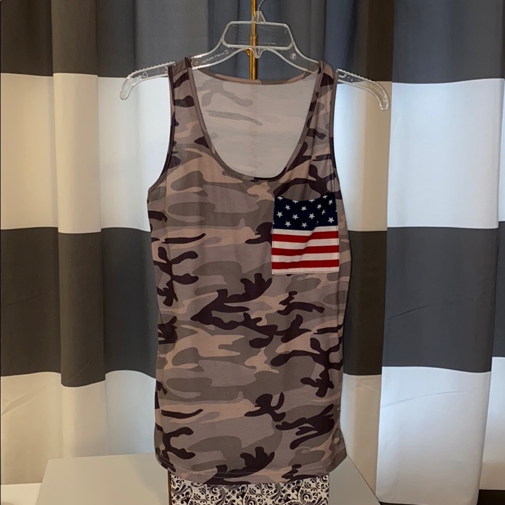 Like new Camouflage tank with flag pocket.